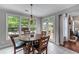 Cozy breakfast nook with views of the outdoor patio and private backyard area at 1610 Turtle Pond Dr, Hoschton, GA 30548