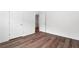 Bedroom featuring wood floors with natural light at 1955 Piedmont Cove Ln, Cumming, GA 30040