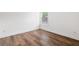 View of a bedroom with wood floors and natural light at 1955 Piedmont Cove Ln, Cumming, GA 30040