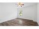 Bedroom with wood floors, natural light and ceiling fan at 1955 Piedmont Cove Ln, Cumming, GA 30040