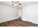 Large bedroom featuring wood floors and closet at 1955 Piedmont Cove Ln, Cumming, GA 30040