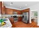 Gourmet kitchen with granite countertops, stainless steel appliances, and ample storage space at 1955 Piedmont Cove Ln, Cumming, GA 30040