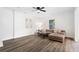 Open living room with hardwood floors, ceiling fan, neutral colors and natural light at 1955 Piedmont Cove Ln, Cumming, GA 30040