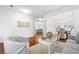 Spacious living room with hardwood floors and access to other rooms at 1955 Piedmont Cove Ln, Cumming, GA 30040