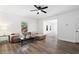 Spacious living room featuring a ceiling fan and an open concept design at 1955 Piedmont Cove Ln, Cumming, GA 30040