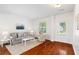 Comfortable living room with ample natural light and a view to the front yard at 1955 Piedmont Cove Ln, Cumming, GA 30040