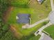 Overhead view of house on large lot with long driveway; mature landscaping; privacy at 3 Tiffany Trce, Palmetto, GA 30268