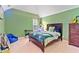 Bedroom featuring a dinosaur themed comforter, vaulted ceilings, and natural lighting at 3 Tiffany Trce, Palmetto, GA 30268