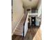 Bright and spacious two-story foyer with hardwood floors and elegant staircase at 3 Tiffany Trce, Palmetto, GA 30268