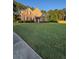 Traditional two-story home with lush lawn and mature trees in a desirable neighborhood at 3 Tiffany Trce, Palmetto, GA 30268