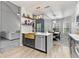 Modern kitchen includes gold accents, island with a farm sink, stainless appliances, and an eat-in breakfast nook at 3 Tiffany Trce, Palmetto, GA 30268