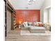 Cozy living room with plush sofa, built-in shelves, and ample natural light at 3 Tiffany Trce, Palmetto, GA 30268