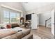 Bright living room featuring vaulted ceilings, neutral tones, and large windows at 3 Tiffany Trce, Palmetto, GA 30268