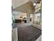 Open living space flowing into dining and kitchen areas, enhancing a sense of togetherness at 3 Tiffany Trce, Palmetto, GA 30268