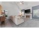 Comfortable living room with a cozy fireplace and neutral color scheme at 3 Tiffany Trce, Palmetto, GA 30268
