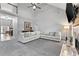 Open living space with tall ceilings, fireplace, and comfortable seating area at 3 Tiffany Trce, Palmetto, GA 30268