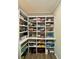 Spacious pantry with floor-to-ceiling shelving providing ample storage space at 3 Tiffany Trce, Palmetto, GA 30268