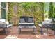 Relaxing seating area with privacy screen on the deck is perfect for entertaining friends and Gathering at 3179 Falls Crest Ct, Buford, GA 30519