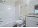 Bathroom featuring a shower/tub and granite vanity at 3242 College St, Atlanta, GA 30337
