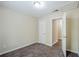 Bedroom with a closet door and brown carpet at 3242 College St, Atlanta, GA 30337