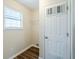 Small closet with a window and hardwood floors at 3242 College St, Atlanta, GA 30337