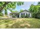 Charming single-story home featuring a cozy front porch and well-maintained lawn at 3242 College St, Atlanta, GA 30337