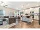 Open-concept living and kitchen area with modern finishes and ample natural light at 450 Rockfern Ct, Lilburn, GA 30047