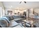 Open-concept living room and kitchen with modern furnishings and stylish decor at 450 Rockfern Ct, Lilburn, GA 30047