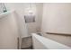 Carpeted staircase with white railing and a decorative pendant light above at 213 Yellowwood Way, Woodstock, GA 30188