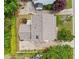 Birds-eye view showing the roof and driveway of a home with mature landscaping around the property at 3405 Haverhill Rowe, Lawrenceville, GA 30044