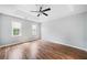 Bedroom with trey ceiling, hardwood floors, and abundant natural light at 3405 Haverhill Rowe, Lawrenceville, GA 30044