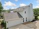 A spacious two-story home showcasing a garage, patio, and well-maintained exterior at 3405 Haverhill Rowe, Lawrenceville, GA 30044