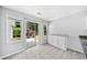 Eat-in kitchen area with sliding glass doors that offer a view of the outdoor living space at 3405 Haverhill Rowe, Lawrenceville, GA 30044
