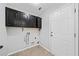 Laundry room provides extra storage space at 3405 Haverhill Rowe, Lawrenceville, GA 30044