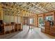 Unfinished basement showcasing the framing, windows, and a walk-out door to the yard at 3617 Carson Se Ln, Smyrna, GA 30080