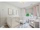 Bright Bedroom with two white cribs, patterned carpet and decor at 3617 Carson Se Ln, Smyrna, GA 30080