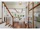 Elegant foyer featuring hardwood floors and seamlessly connecting to the open-concept living area at 3617 Carson Se Ln, Smyrna, GA 30080