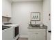 Laundry room featuring a washer, dryer and granite countertop at 3617 Carson Se Ln, Smyrna, GA 30080