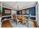 Formal dining room with coffered ceiling, chandelier, and elegant decor at 641 Lake Overlook Dr, Canton, GA 30114