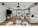Cozy living room featuring large screen, comfortable seating, and plenty of space for entertaining at 641 Lake Overlook Dr, Canton, GA 30114