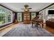 Cozy living room with piano, large windows, and ample natural light at 641 Lake Overlook Dr, Canton, GA 30114
