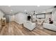Spacious living room with seating and large screen, offering a comfortable and functional living space at 641 Lake Overlook Dr, Canton, GA 30114