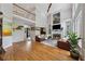 Spacious living room with soaring ceilings, fireplace, built-ins, and hardwood floors at 641 Lake Overlook Dr, Canton, GA 30114