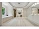 Spacious main bathroom features tiled floors, garden tub, glass shower and double sinks at 641 Lake Overlook Dr, Canton, GA 30114