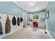 Mud room with desk, storage cabinets, coat hooks and designer tile at 641 Lake Overlook Dr, Canton, GA 30114