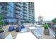 Outdoor patio with modern furniture, great for entertaining with views of the surrounding area at 788 W Marietta Nw St # 811, Atlanta, GA 30318