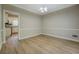 The dining room features hard wood floors and classic lighting at 1201 Justin Ln, Lithonia, GA 30058