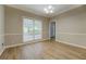 The dining room features hard wood floors and classic lighting at 1201 Justin Ln, Lithonia, GA 30058