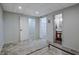 Basement area featuring access to a bathroom, closet, and secondary bedroom at 150 Gill Ln, Stockbridge, GA 30281
