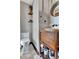 Cozy bathroom with toilet and unique sink made from reclaimed wood for rustic charm at 150 Gill Ln, Stockbridge, GA 30281